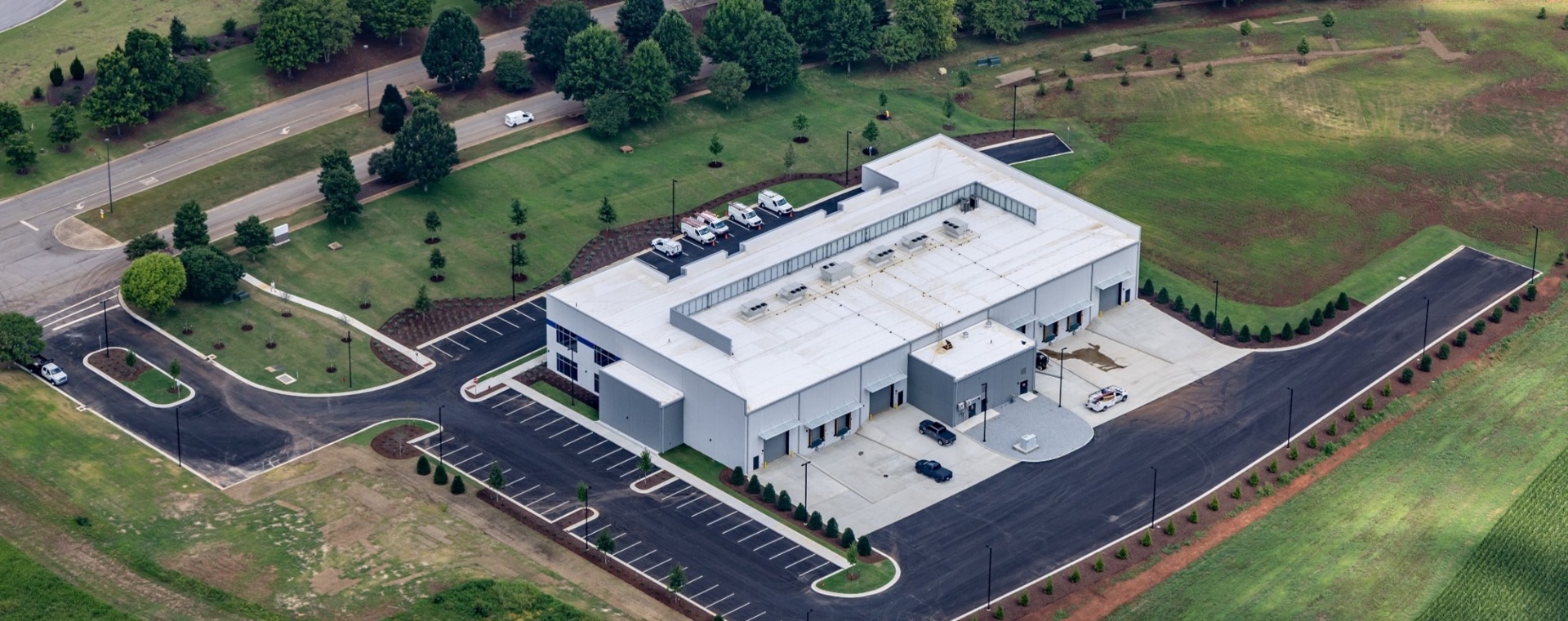 Aurex–Telesis MISSION Center operations floor in Huntsville, AL with live telemetry, radar, and trajectory displays